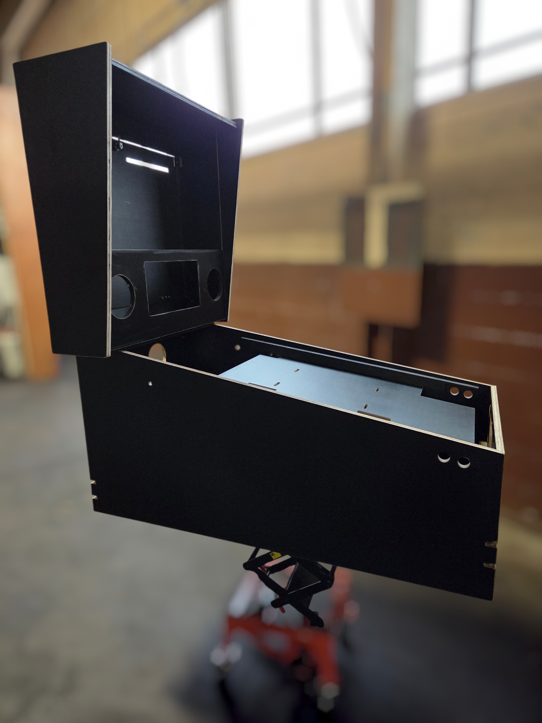 Flat pack and fully assembled virtual pinball cabinets side by side from PinballCabinet.com
